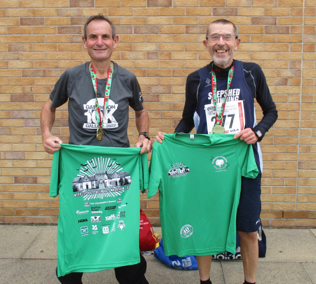 Ray and Stuart posing with medals and t-shorts after the Worksop Half Marathon